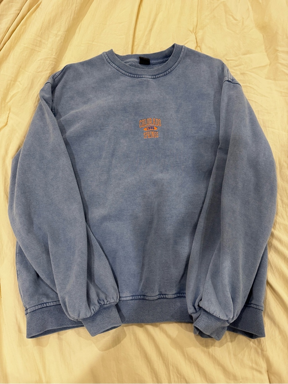Urban Outfitters Washed Blue Crewneck with Orange Chest Logo